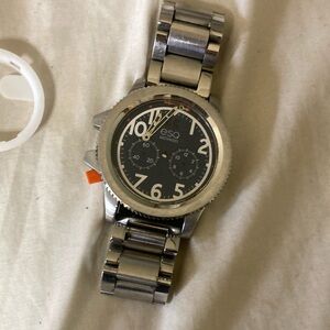 Movado Silver and Black Watch with Timeless Elegance !parts!